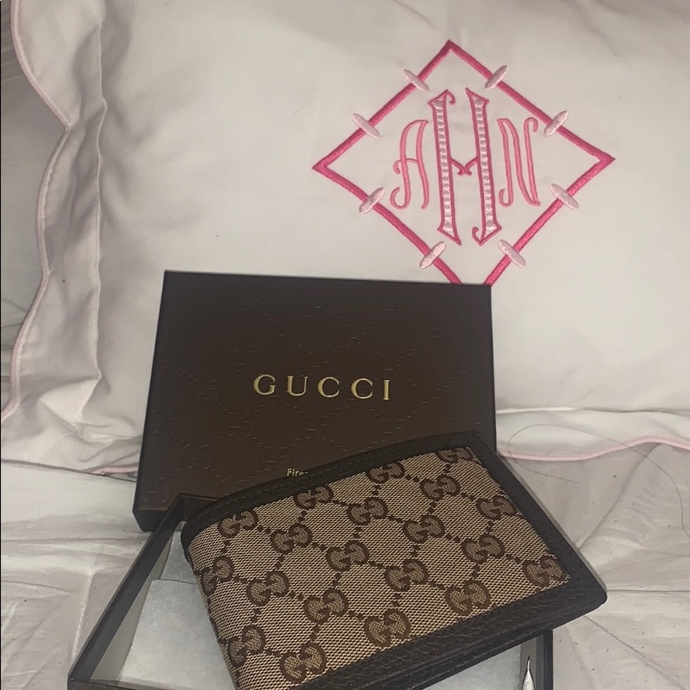 Gucci Men’s Monogrammed Bifold Wallet Dark Brown